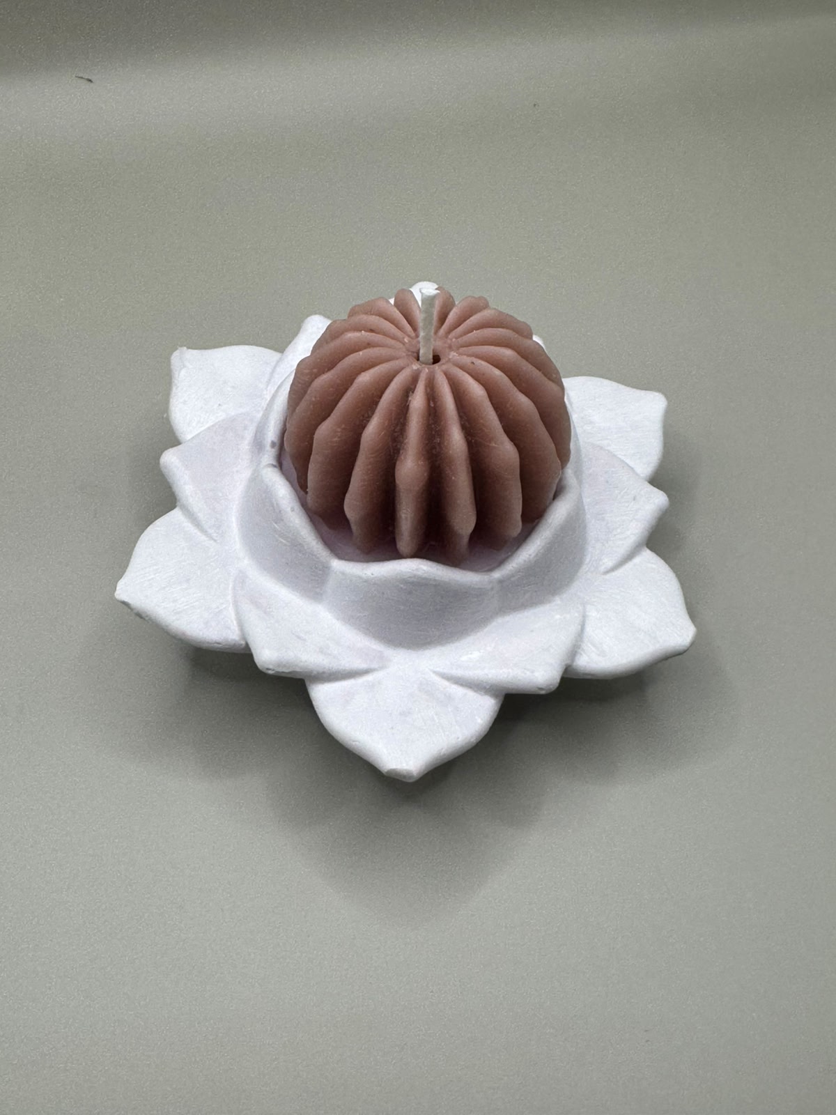 Scented candles in ceramic castings