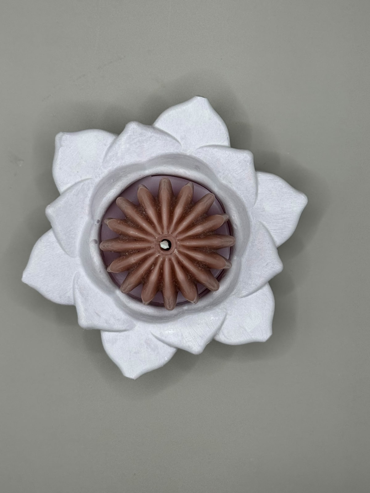 Scented candles in ceramic castings